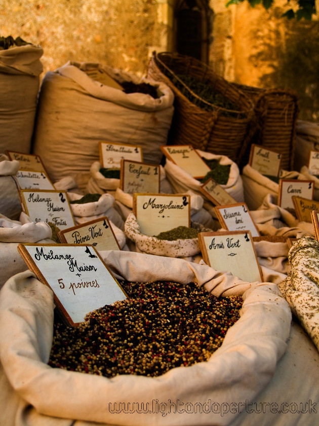 Aups1 
 French market stall of herbs and spices 
 Keywords: Provence France French Holiday market herbs spices baskets sacks town stall europe travel vacation