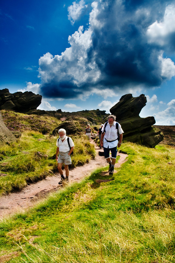 DSC 1041 
 Hikers 
 Keywords: peak district national park countryside landscape english walkers hikers path walk green blue sky