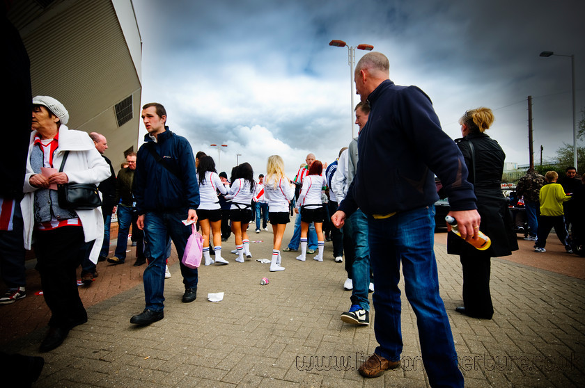 DSC 3357 
 Young girls in make up and short shorts help boost England's bid to host the 2018 World Cup by convincing Wearside's red blooded males to 'back the bid'. 
 Keywords: Sunderland, football, girls, world, cup, supporters, 2018, soccer