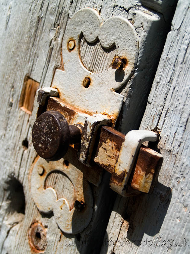 Chateau1 
 chateau door bolt 
 Keywords: Provence France French Mediterranean door handle lock bolt wood building
